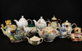 A Collection Of Novelty Decorative Tea Pots To Include Novelty Tea Pot In The Form Of A Cat,