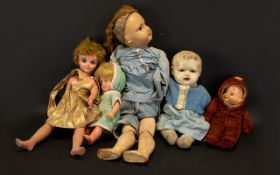 A Collection Of Playworn Vintage Dolls To include 1960's plastic dolls,