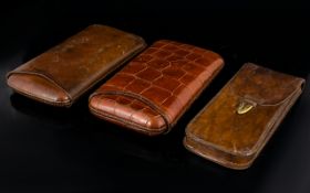 Three Leather Cigar Cases Each in good condition, comprising Mock reptile slip cover case,