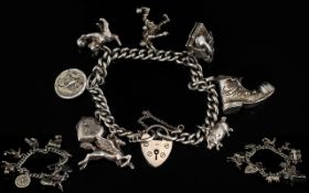 Silver Curb Bracelet Loaded with 8 Silver Charms / Padlock.