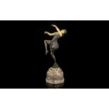Art Deco Style Figurine Cast metal figure in the form of a dancing girl in corset and bloomers,