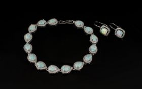 Opal and Zirconia Tennis Bracelet and Pair of Drop Earrings, the bracelet comprising fifteen pear