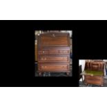 Mahogany Finish Bureau Fall front with fitted interior lined in green leatherette,