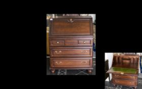Mahogany Finish Bureau Fall front with fitted interior lined in green leatherette,