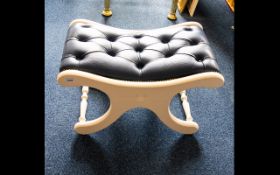 X - Framed Concave Footstool - royal blue leather button rest on white painted frame.