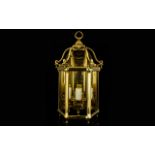 Heavy Brass Wall Lantern complete with glass panels. Decorative lantern in good condition.