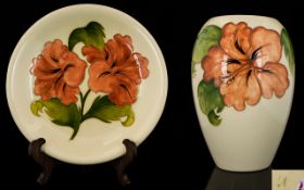 Walter Moorcroft Tubelined Vase 'Coral Hibiscus' Design on cream ground. Height 7.25" - 18.60 cm.