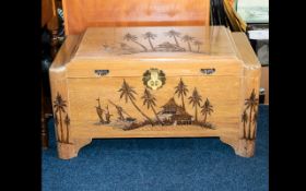 Oriental Carved Coffer - of traditional square form with hinged lid and carved palm tree detail to