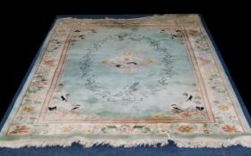 Oriental Style Wool Rug - rectangular carpet with cream border detail and Japanese crane design on