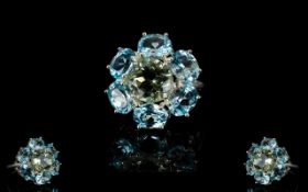Green Amethyst and Sky Blue Topaz Statement Ring, a round cut green amethyst, of 3cts,