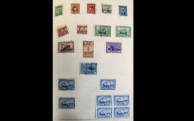 Blue Springback Stamp Album - with a good selection from the British commonwealth.. Includes a