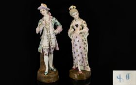 A Pair Of 19th Century Figures In The Form Of Dandies Each with impressed marks to base,