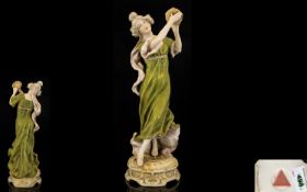 Royal Dux Bohemia Handpainted Figurine of a Female Tambourine Player. Circa 1900. Pink triangle