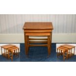 A Nest Of G Plan Style Teak Tables Three in total of typical form, tallest 22 inches,