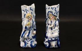 Pair of Victorian Flat Back Spill Vases - 1840 - 1909 blue and white with figures.