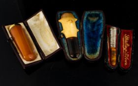 Cased Amber Cheroot Holder With Gold Collar Continental marks to collar, in original case.