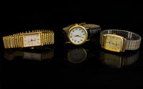 A Collection Of Fashion Watches Three in total to include Lorus gold tone watch with brushed gold