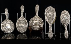 Embossed Silver Backed Vanity Items Five pieces in total,