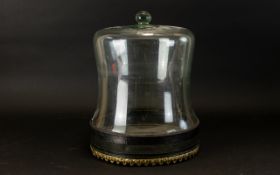 A Shaped Glass Display Dome And Stand With Aerated metal stand. Height, 13 inches.