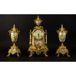 Franz Hermle & Sons Garniture Set Comprising mantle clock with figural transfer printed image on