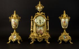 Franz Hermle & Sons Garniture Set Comprising mantle clock with figural transfer printed image on