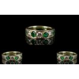 Ladies 9ct White Gold Attractive 7 Stone Emerald and Diamond Ring. The 3 Round Brilliant Cut
