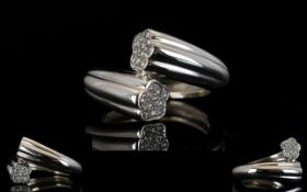18ct White Gold Diamond Ring Of torque design, the terminals pave set with diamonds, weight, 10.