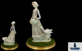 Lladro Large Porcelain Figure 'Girl with Goose'. model no 4815, Issued 1972-1991, height 12.