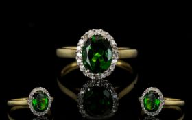 9ct Gold Diamond And Gemset Cluster Ring Central faceted green stone surrounded by round cut