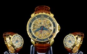 Theorema Pionier Wristwatch Mechanical movement with gold tone case and skeleton face showcasing