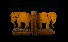 Pair of Indian Wooden Carved Bookends Depicting Two Elephants. Attractive bookends in carved wood.