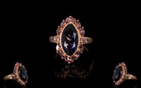 Colour Change Alexandrite Quartz and Rhodolite Garnet Ring, a 4ct marquise cut alexandrite quartz,