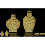 Chinese 19thC Pair of Well Carved Resin Snuff Bottles of good form and quality. Character marks to