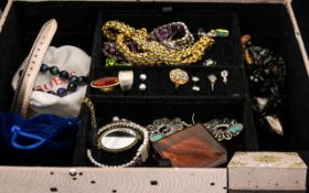 A Jewellery Box With Integral Mirror Containing A Small Amount Of Costume Jewellery To include