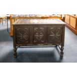 Oak Jacobean Style Bedding Box Comprising carved panel front and top. Raised on turned stretchers.