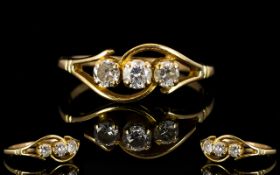 18ct Gold Three Stone Diamond Ring Set with three round brilliant cut diamonds, stamped 750,