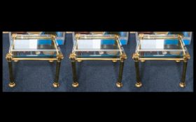 A Collection of Three Modern Brass Framed Glass Topped Tables - square lacquered brass frames with