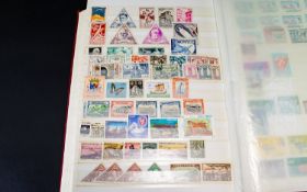 Four Mixed Stamp Albums With A Variety Of World Wide Stamp Albums Including Large Quantity Of