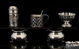 A Pair Of Silver Salts Two cauldron shaped salts raised on paw pad feet,