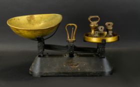 Traditional Kitchen Scales 'The Viking' in black metal with brass weighing bowl,