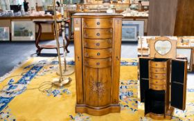 Floor Standing Jewellery Cabinet Slim cabinet with floral decoration to outer,