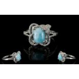 Larimar Solitaire Ring, a cushion cut larimar of 2.5cts set in a decorative milgrain mount with a