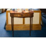 A Pair of Mahogany Console Tables - shaped fronts with two frieze drawers raised on turned,