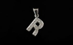 18ct White Gold Letter R Pendant Pave set with round modern brilliant cut diamonds, unmarked,