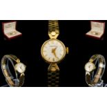 Rodania Ladies Mechanical 9ct Gold Bracelet Watch. Both case and bracelet marked for 9ct. 16.