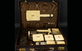 Art Deco Twelve Piece Travelling Vanity Set Each with gilt silver collars, hallmarked London 1941