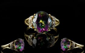 Ladies 9ct Gold Mystic Topaz Set Dress Ring with Diamond Shoulders. Fully Hallmarked for 9ct.