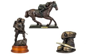 Military Interest Two Bronzed Resin Figures The first in the form of a Royal Marines Commando,