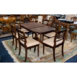 A Late 20th Century Mahogany Extending Table And Six Chairs Of oval form,