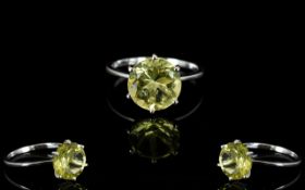 Lemon Quartz Solitaire Ring, a round cut lemon quartz, 11mm in diameter and of 4cts,